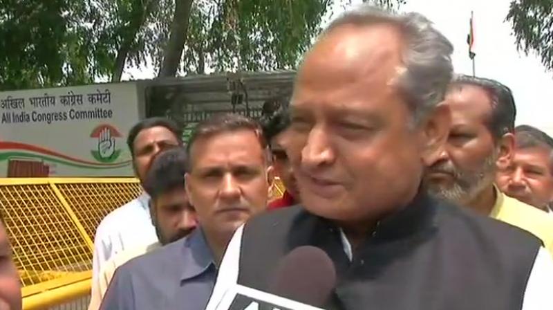 Congress leader Ashok Gehlot alleged that PM Modis temple visits in Nepal were a violation of the poll code on a day Karnataka voted. (Photo: ANI/Twitter)