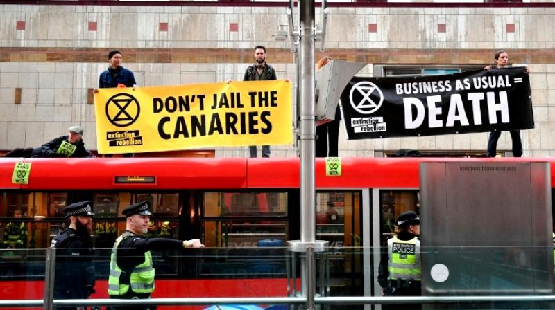 Climate protests take over Londonâ€™s financial hub