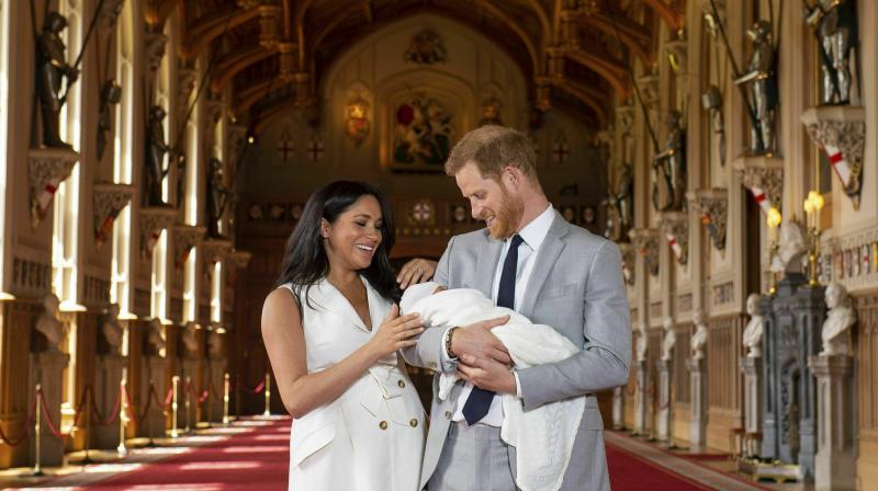 Prince Harry, Meghan present Baby Sussex to the world