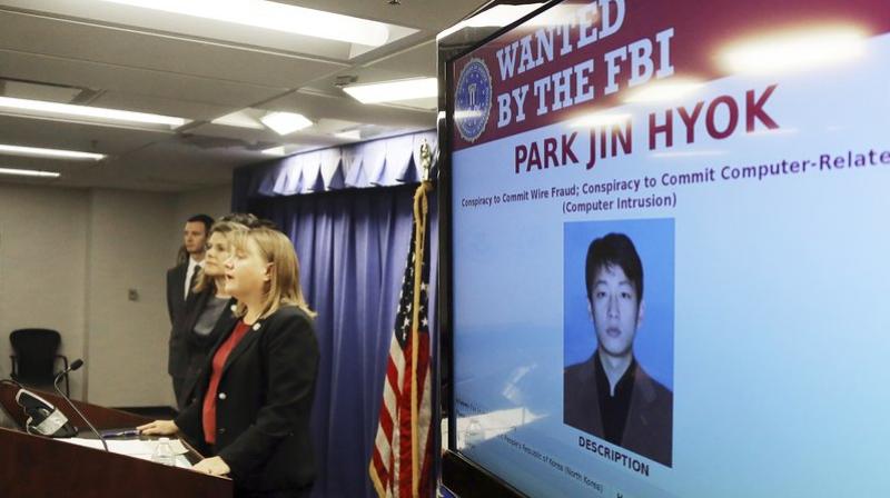 United States Attorney Tracy Wilkison announces a criminal complaint being filed against a North Korean national accused in a series of destructive cyberattacks around the world, at a news conference in Los. The complaint alleges Park Jin Hyok, computer programmer accused of working at the behest of the North Korean government, was charged Thursday in connection with several high-profile cyberattacks, including the Sony Pictures Entertainment hack and the WannaCry ransomware virus that affected hundreds of thousands of computers worldwide. (AP Photo/Reed Saxon)