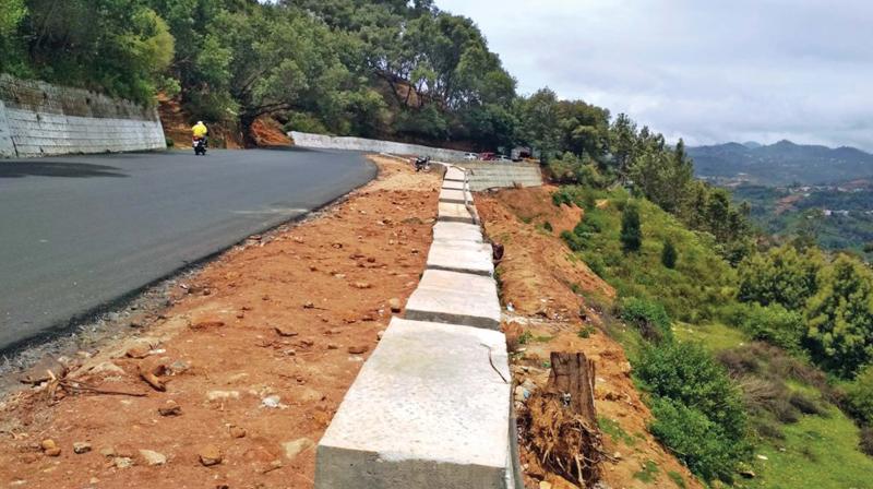 Road widening work underway along Manthada-Yellanalli sector of Ooty NH.	(DC)