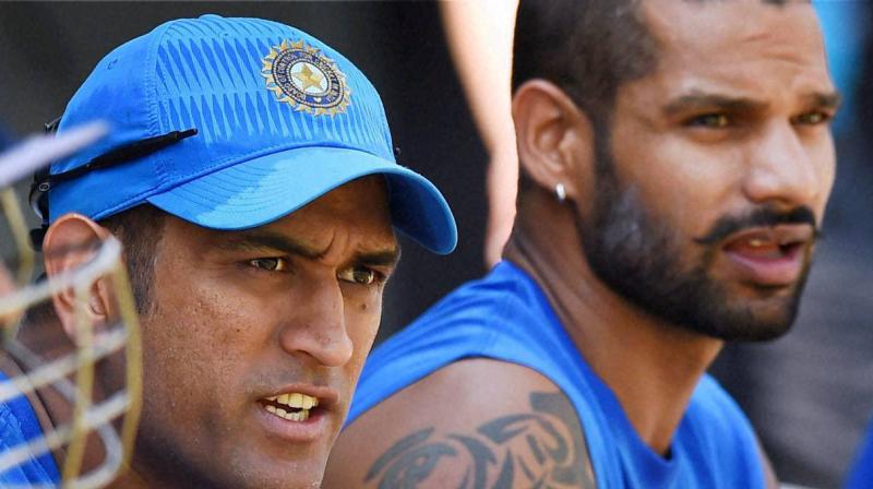 Dhawan, who was dropped from the Test team, is spending time with family in Melbourne following the T20 leg of the Australia while Dhoni has had no cricket since the ODI series against the West Indies ended on November 1. (Photo: PTI)
