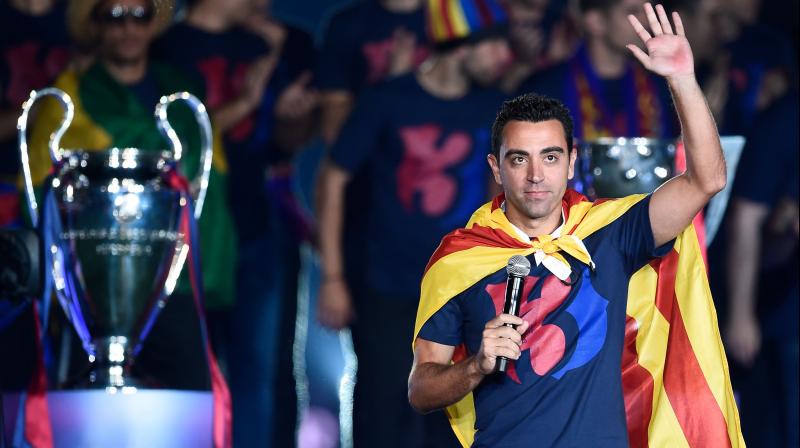 Xavi further confirmed his intention to follow in the footsteps of Dutch footballer and coach Johan Cruyff. (Photo: AFP)