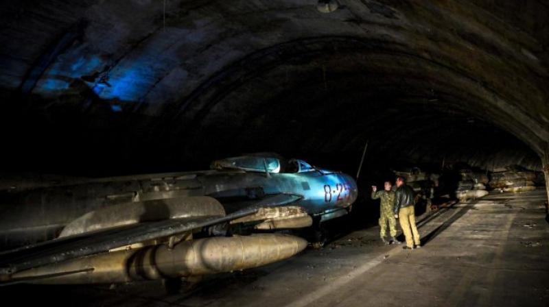 In hidden mountain air base, Albania stores jets for sale