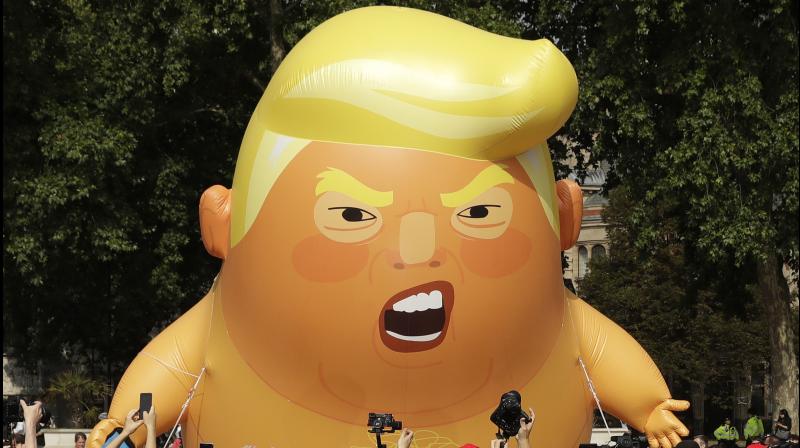 Giant blimp of Trump as angry, nappy-clad baby to fly in London today