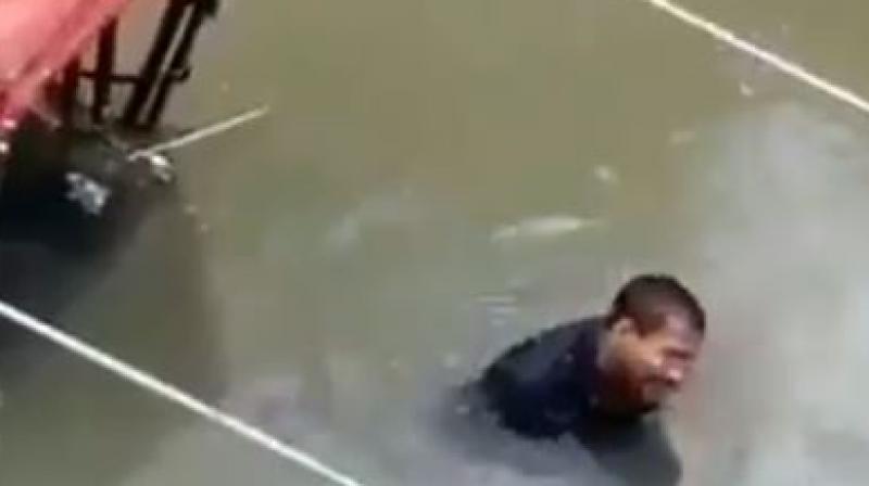 Watch: Man stuck in Patna floods refuses to leave his rickshaw, cries for help