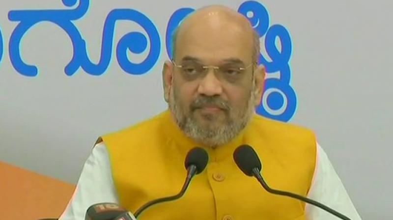 Shah said the Congress has become a symbol of corruption and added that the people of Karnataka have made up their mind to change Siddaramaiah government. (Photo: ANI/Twitter)