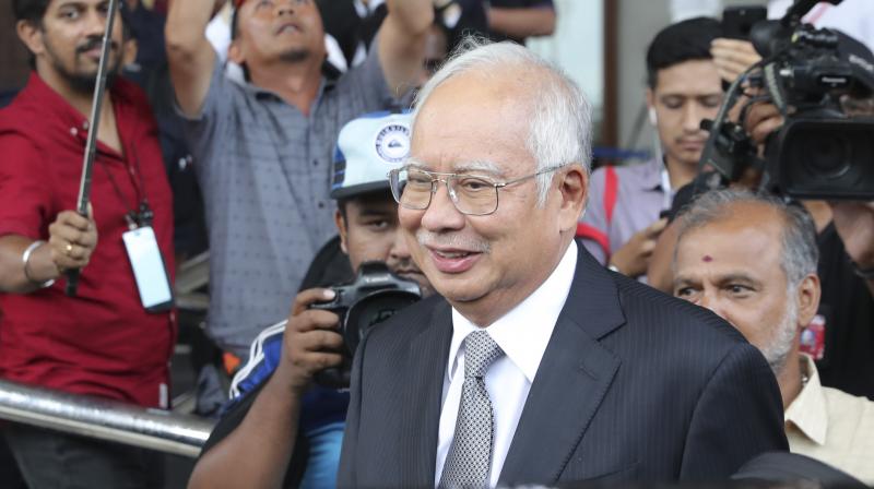 Malaysia ex-PM Najib Razak\s 1MDB graft trial resumes