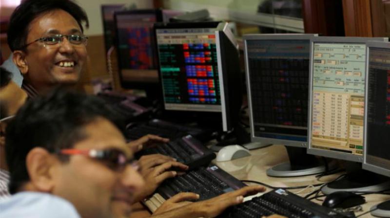 With exit polls forecast of ruling NDA\s victory, Sensex climbs 1,400 points