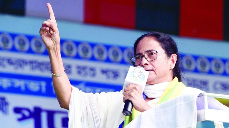 West Bengal Chief Minister Mamata Banerjee addresses a rally Maidan in Cooch Behar on Monday.(Image DC)