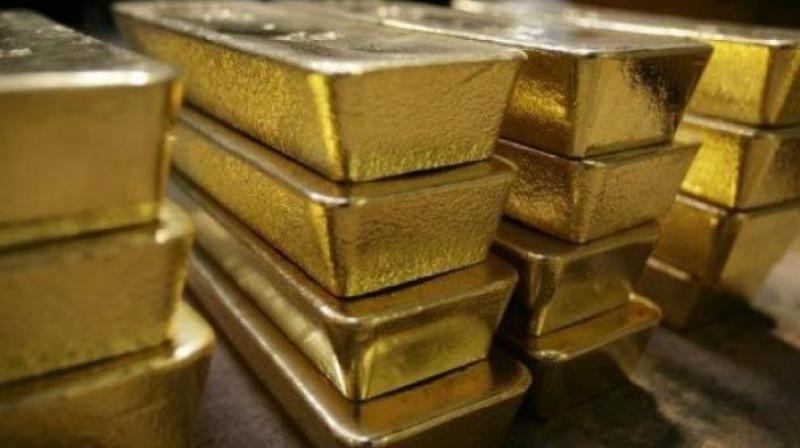 Gold prices surge by Rs 180 on firm global trend