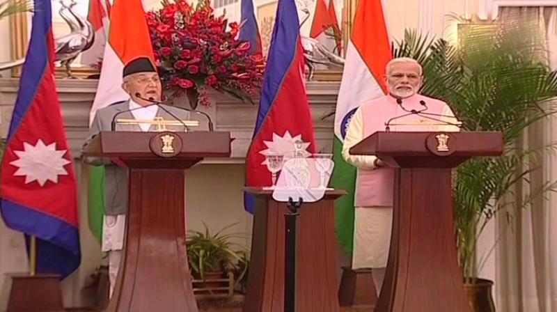 Prime Minister Narendra Modi (R) and Nepal PM KP Sharma Oli (L) issued a joint press statement on Saturday afternoon. (Photo: ANI | Twitter)