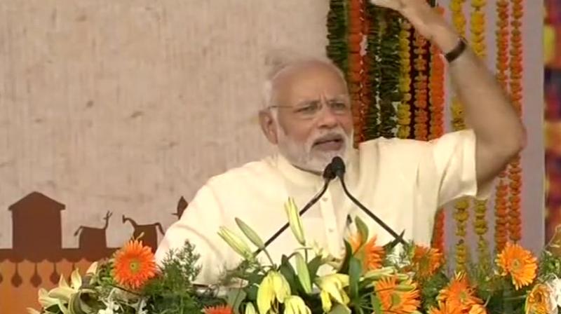 The Prime Minister espoused that the government was working to increase the income and ensuring quality education of the tribals in Chhattisgarh. (Photo: ANI | Twitter)