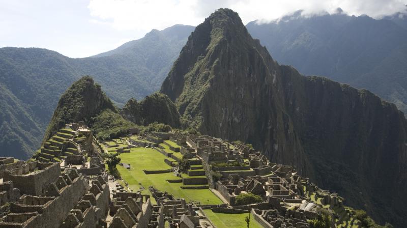 Machu Pichu was an Incan city surrounded by temples, terraces and water channels, built on a mountaintop.