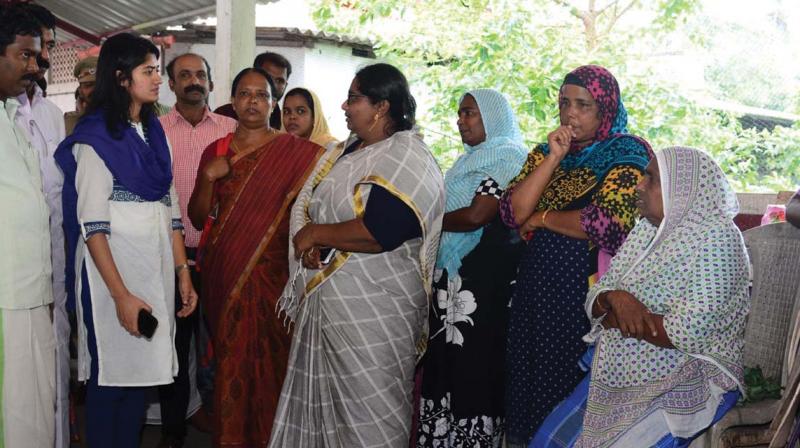 Alappuzha district collector T. V Anupama visits cyclone-hit people at a  rehabilitation camp at Purakkad on Saturday.