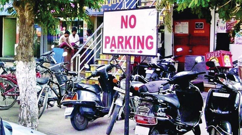 Parking curbs for shopowners on Avenue Road
