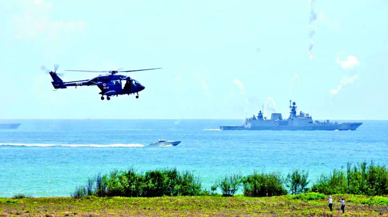 Choppers showcase their manoeuvring ability at the DefExpo live demonstration at Thiruvidanthai on Wednesday. (Photo: DC)