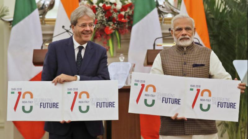 Prime Minister Narendra Modi makes a press statement as his Italian counterpart Paolo Gentiloni listens after their meeting in New Delhi on Monday, Oct 30, 2017. (Photo: AP)