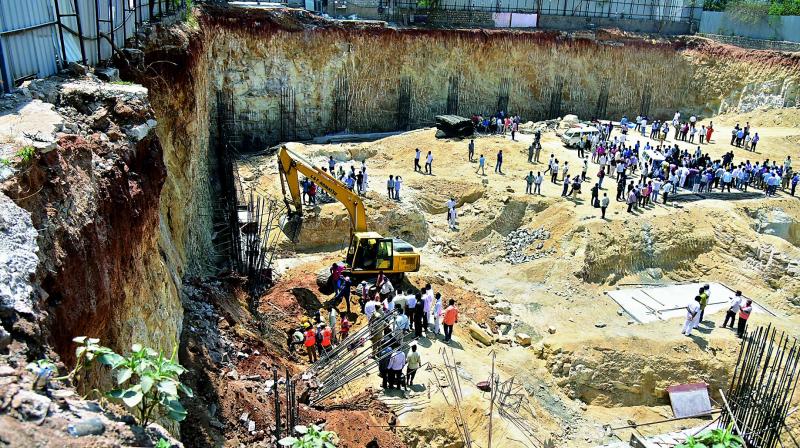 A view of the portion of land that caved in at Kondapur, killing two construction workers.