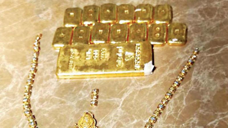 The gold bars recovered from the arrested accused at KIA in Bengaluru on Sunday.