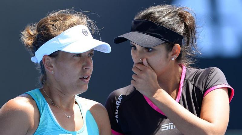 The third seeded pair of Sania Mirza and Barbora Strycova was defeated by the unseeded Canadian-Chinese pair of Gabriela Dabrowski and Xu Yifan 6-4, 6-3. (Photo: AFP)