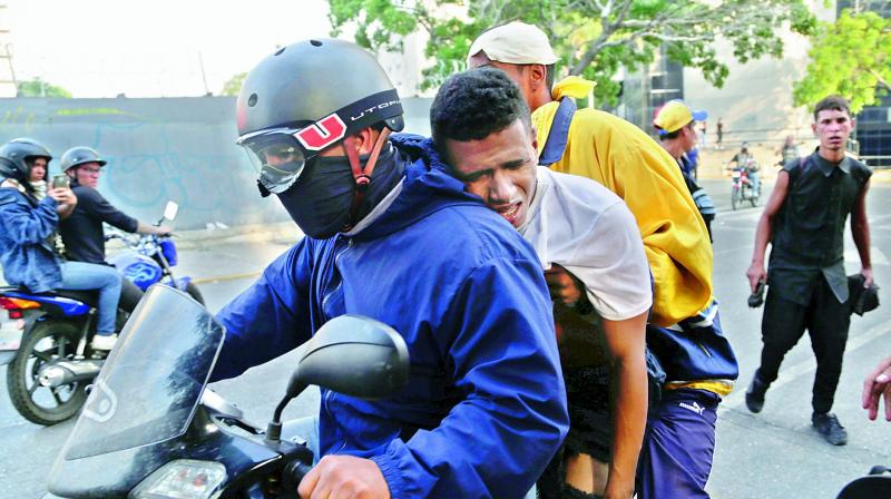 One dead, 46 hurt in May Day clashes in Venezuela