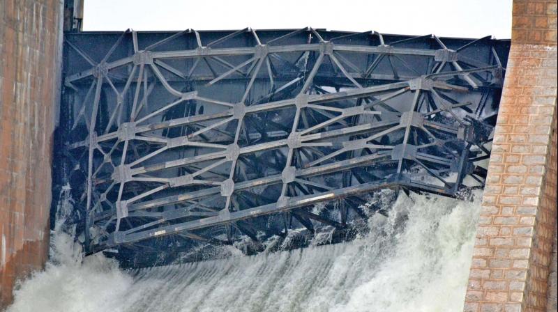 Water gushing out of main gate numbers one and five  in KRP dam. (Photo: DC)