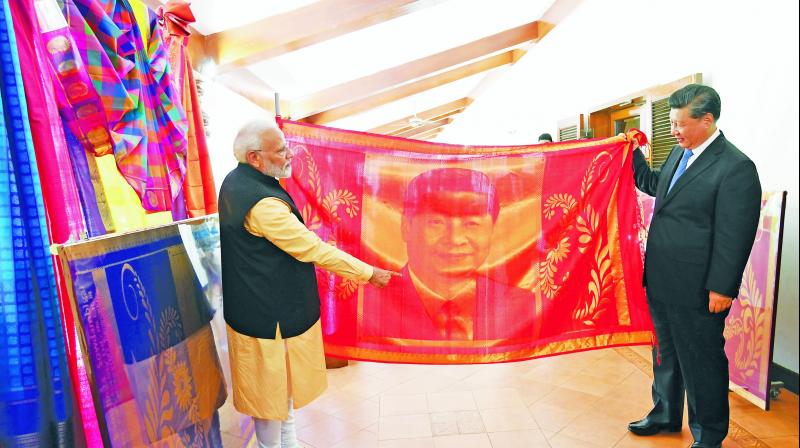 Narendra Modi gifts XI Jinping silk portrait