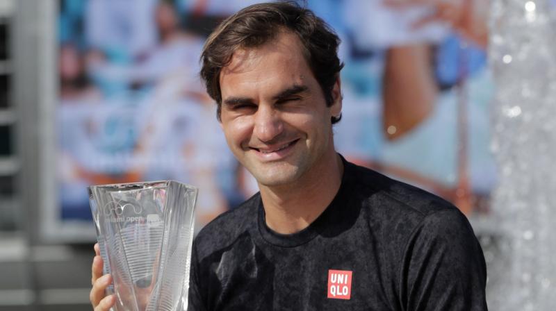 Miami Open: Federer defeats injured Isner to capture his record 101st title