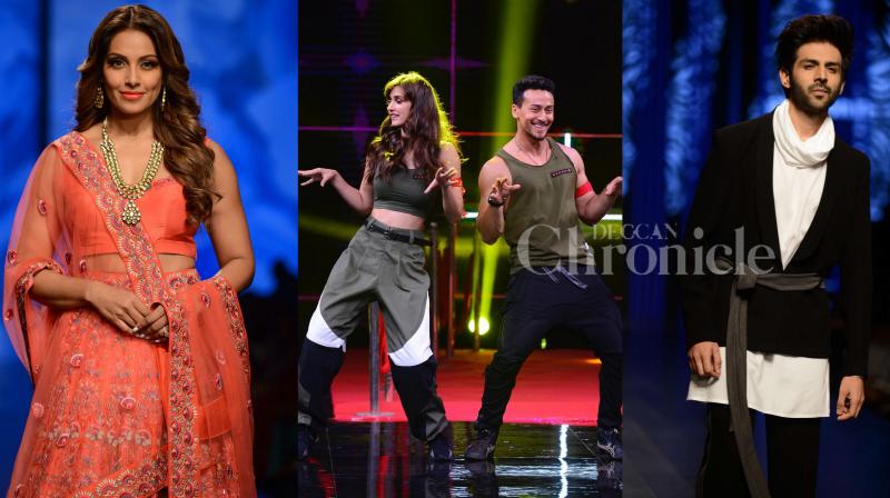 B-town stars clicked: Kartik, Bipasha walk the ramp, Tiger-Disha on show