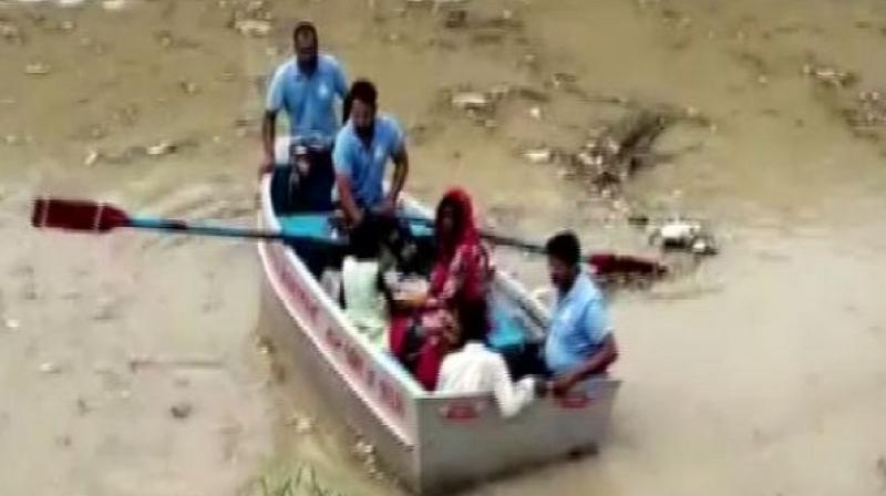 Delhi: Disaster Management Authority rescues family after Yamuna breaches danger mark