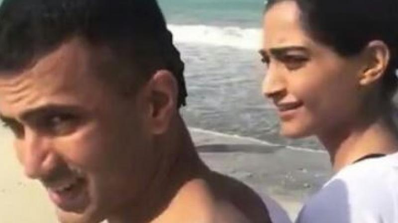 A screenshot of the video of Anand Ahuja and Sonam Kapoor taking a walk.