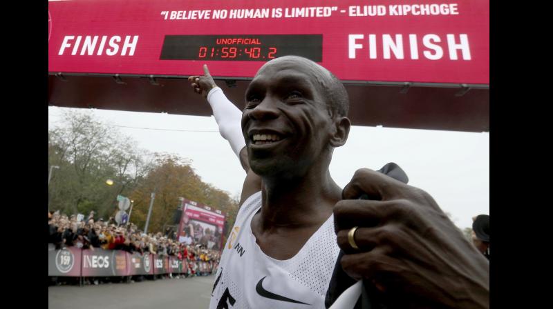 Eliud Kipchoge is first to dip under 2 hours for marathon; watch