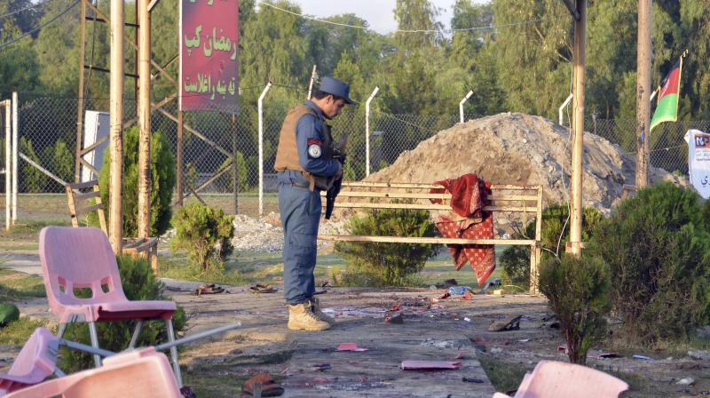 The blasts exploded among spectators crowded into the stadium at around 11pm (1830 GMT) on Friday evening as they watched the local \Ramadan Cup\, the provincial governors office said. (Photo: AP)