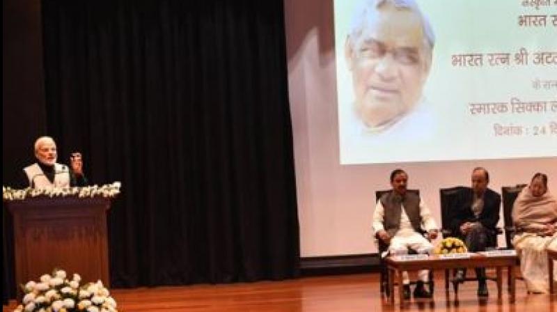 Releasing a Rs 100 commemorative coin in the memory of former prime minister Atal Bihari Vajpayee on the eve of his 94th birth anniversary, PM Modi said the late prime minister spent most of his political life in the opposition benches but always thought of the country and its people. (Photo: Twitter | @PIB India)