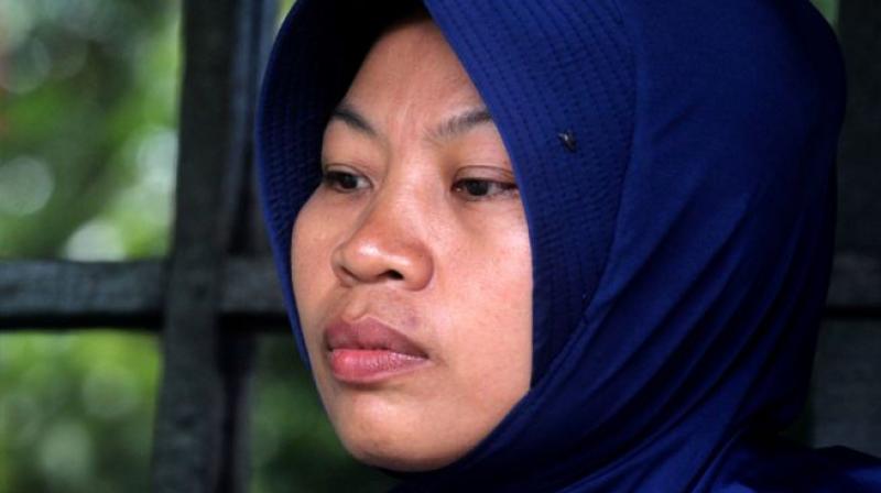 Indonesian woman jailed for reporting harassment from boss, pardoned