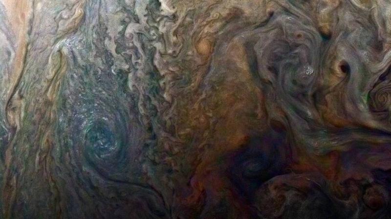 The NASAs spacecraft Juno, orbiting around Jupiter, acquired the image of a â€œDark Spotâ€ through the JunoCam on Feb. 2, 2017 (Photo: NASA)