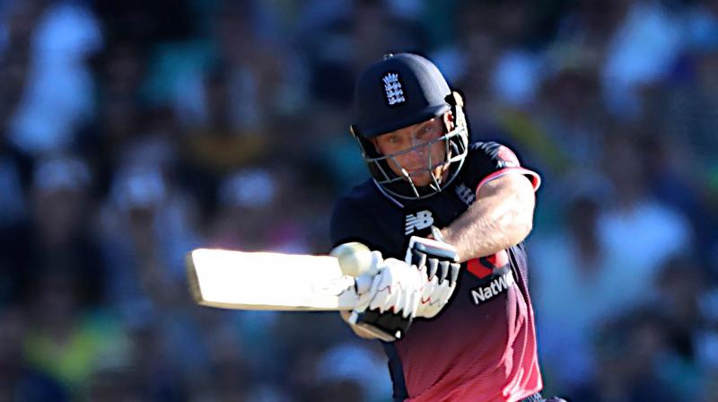 Jos Buttler hit two runs off the final ball to complete his first ODI century against Australia after sharing an unbroken 113-run partnership with Chris Woakes that proved the difference between the sides.(Photo: AFP)