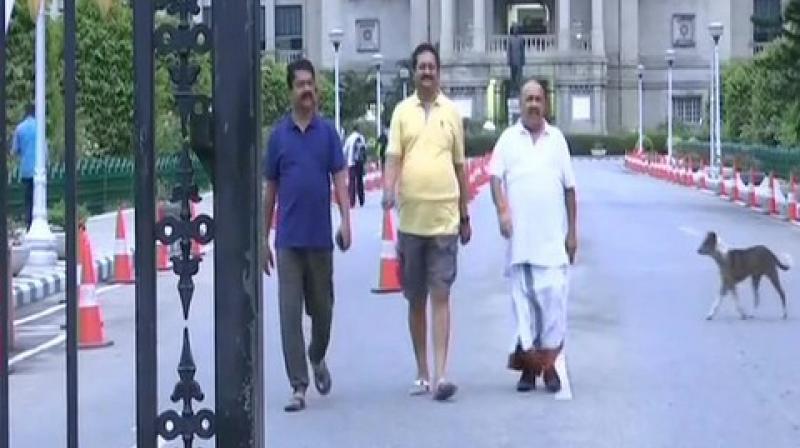 After night-long dharna, BJP lawmakers take morning walk around Vidhana Soudha