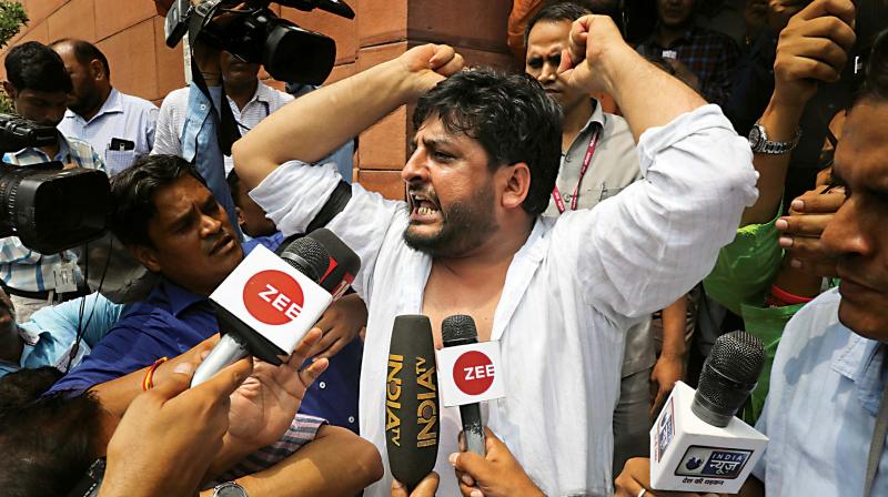 In the Rajya Sabha, Constitution copy, shirts torn up