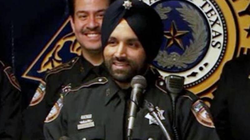 Americans mourn killing of trailblazing Indian-American Sikh police officer in Texas