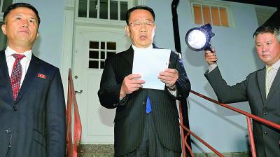 North Korean negotiator Kim Miyong Gil reads statement outside the North Korean Embassy in Stockholm, Sweden on Saturday.(Photo: AP)