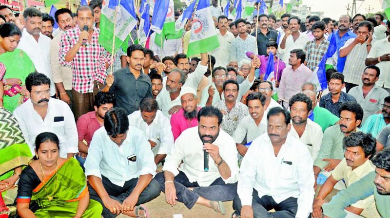 Nellore rural MLA K. Sridhar Reddy seen protest at current office center in Nellore city against to attack on Jagan.