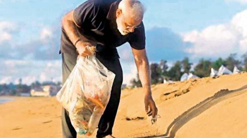 Prime Minister Narendra Modi plogging at the Mamallapuram beach; (top right) Recently, 11,000 kg garbage was removed from Mt Everest in a two-month long cleanliness drive.