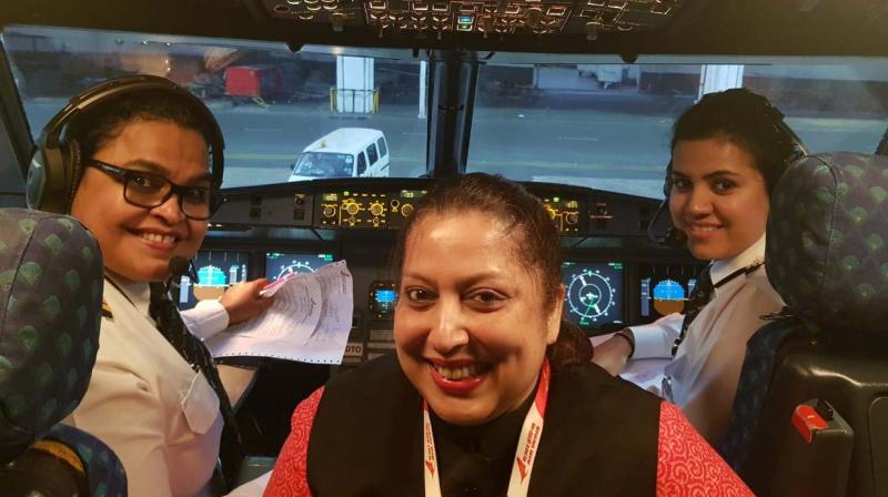 Captain M.Deepa Commander First officer and Vrinda Nair operate all women crew Air India flight Chennai to New Delhi along with women staff as part of Womens Day celebrations. (Image DC)