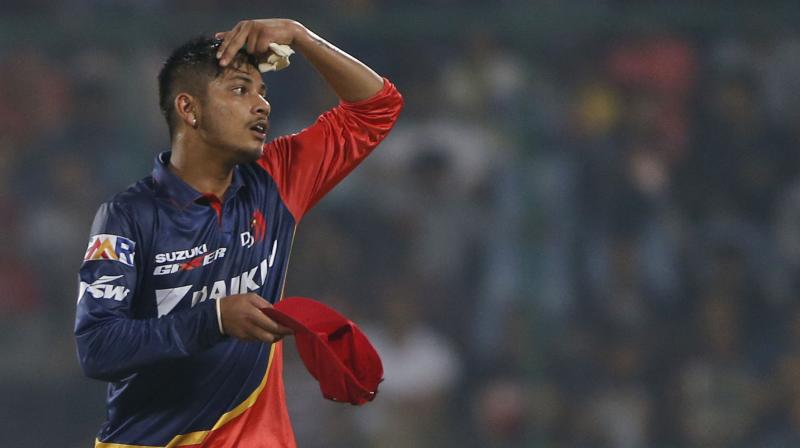 Sandeep Lamichhane, aged 17 and the first Nepalese player to land an IPL contract, took one wicket for 25 from his four overs opening the attack with his leg-spin for Delhi Daredevils against Royal Challengers Bangalore. (Photo: AP)