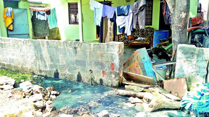 With no proper drainage in place water from a household toilet stagnates on the roadside in Deendayalnagar Colony on Thursday. 	(Photo:  DC)