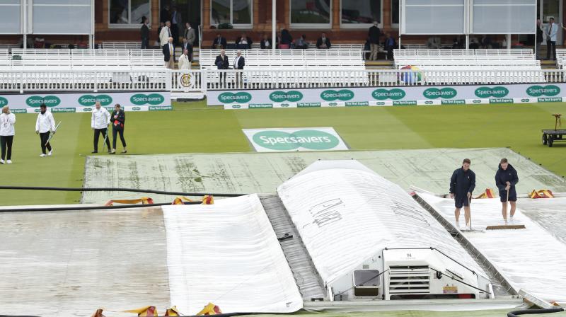 When the match should have been getting underway, the square and pitch remained fully covered and prospects of any play before lunch appeared slim. (Photo: AP)