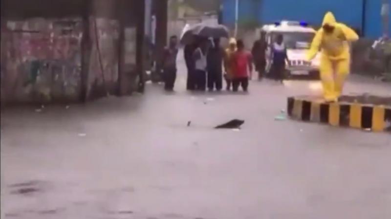 Watch: Mumbai police officer rescues dog from drowning