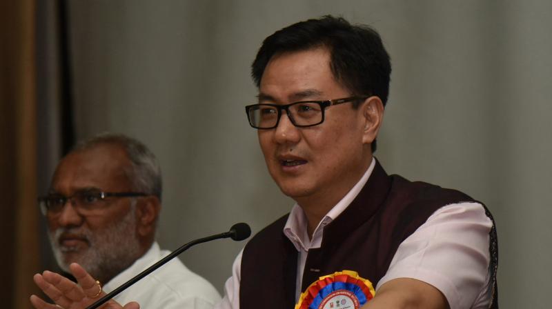 Union minister of state for home Kiren Rijiju speaks at the youth convention on national security in the city on Thursday as Mr Perala Shekar Rao, vice-chairperson of the Nehru Yuva Kendra Sangathan looks on. (Photo: DC)